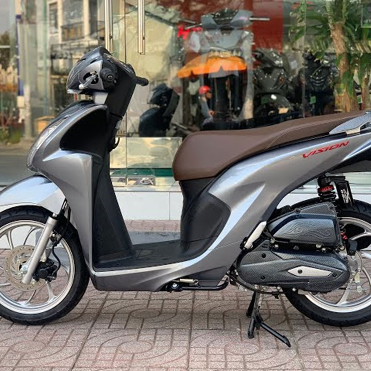 dán chống xước xe máy vision bao nhiêu tiền