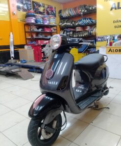 Dán xe Vespa màu nâu ánh 7 màu