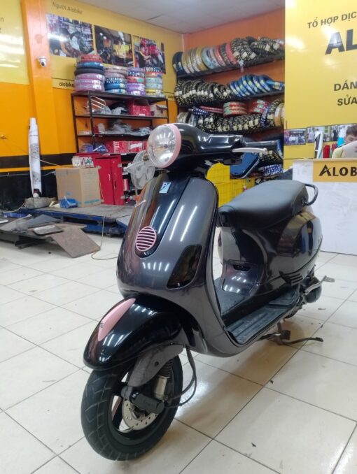 Dán xe Vespa màu nâu ánh 7 màu