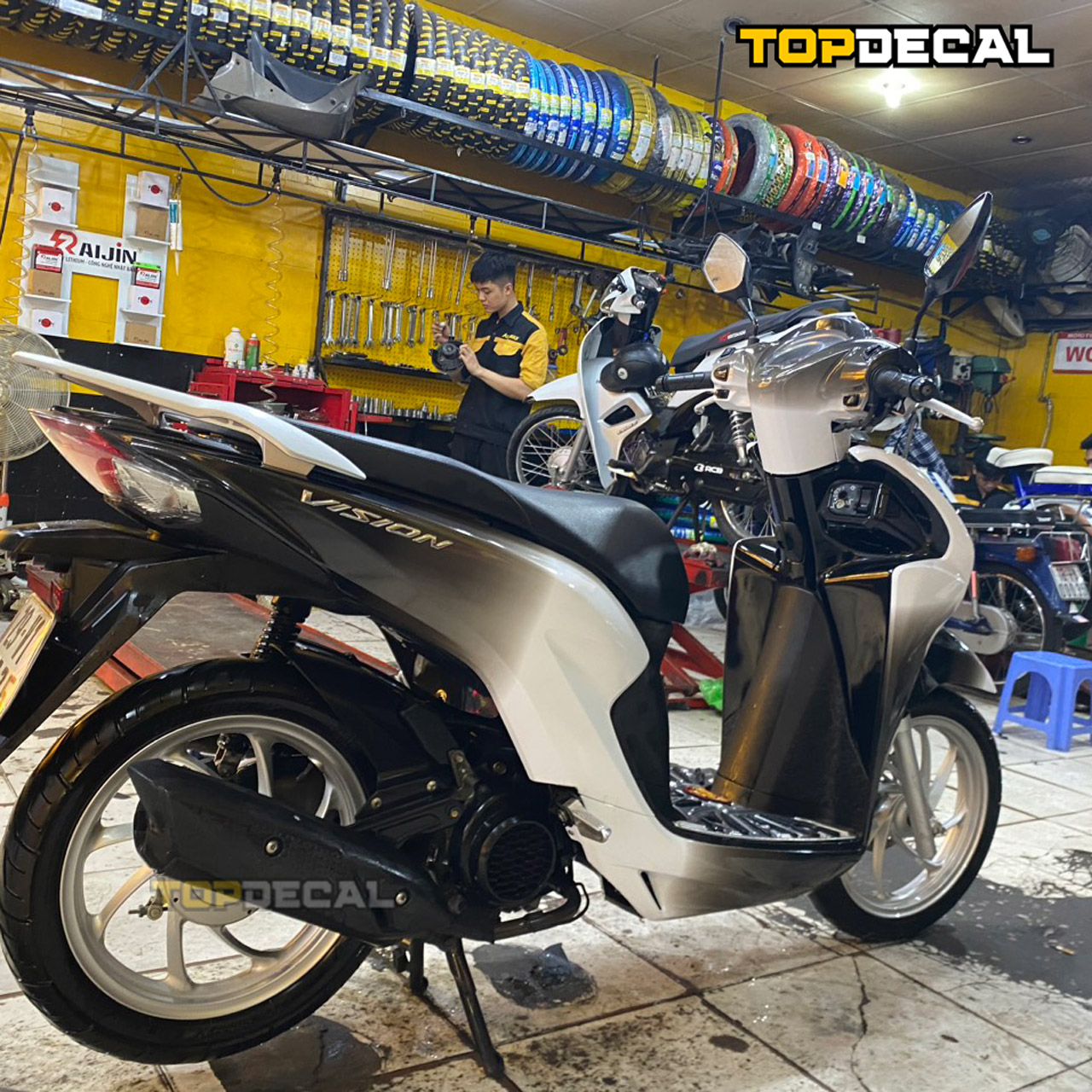 Dán decal xe Vision