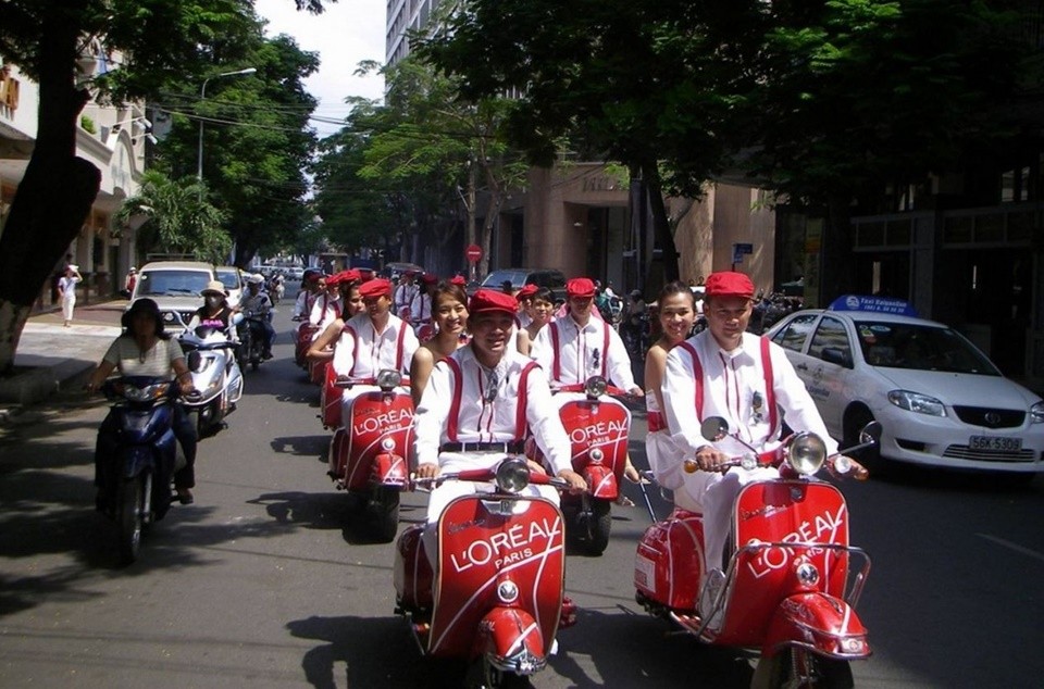 dán xe máy quảng cáo