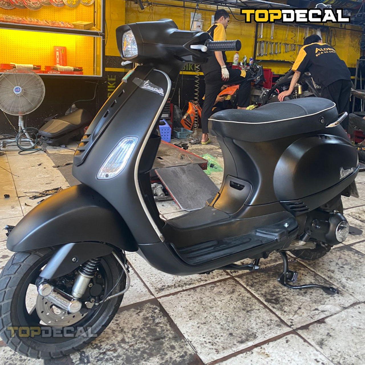 dán xe vespa giá bao nhiêu
