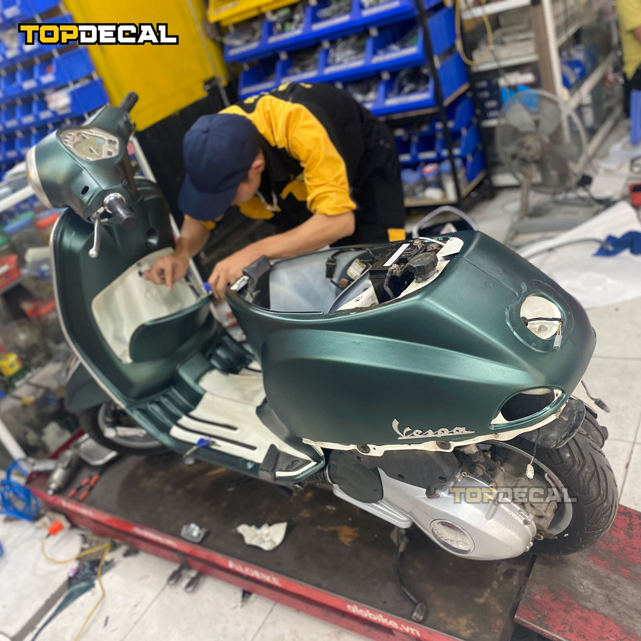dán xe vespa giá bao nhiêu